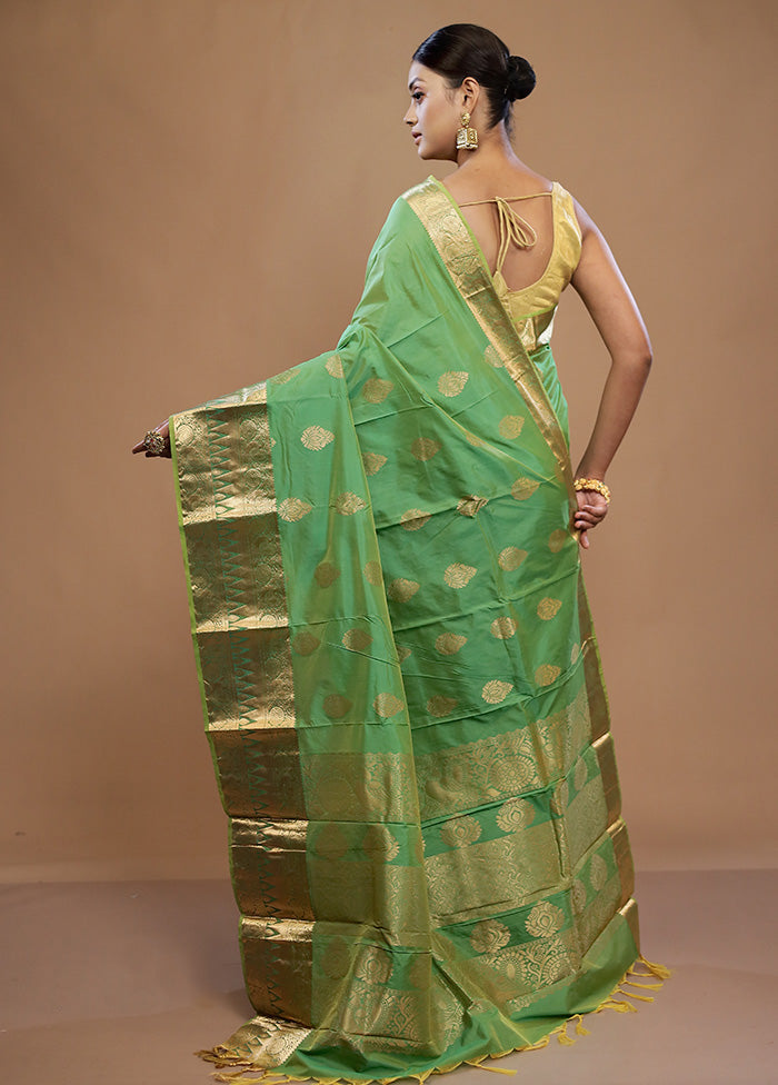 Green Kanjivaram Silk Saree With Blouse Piece