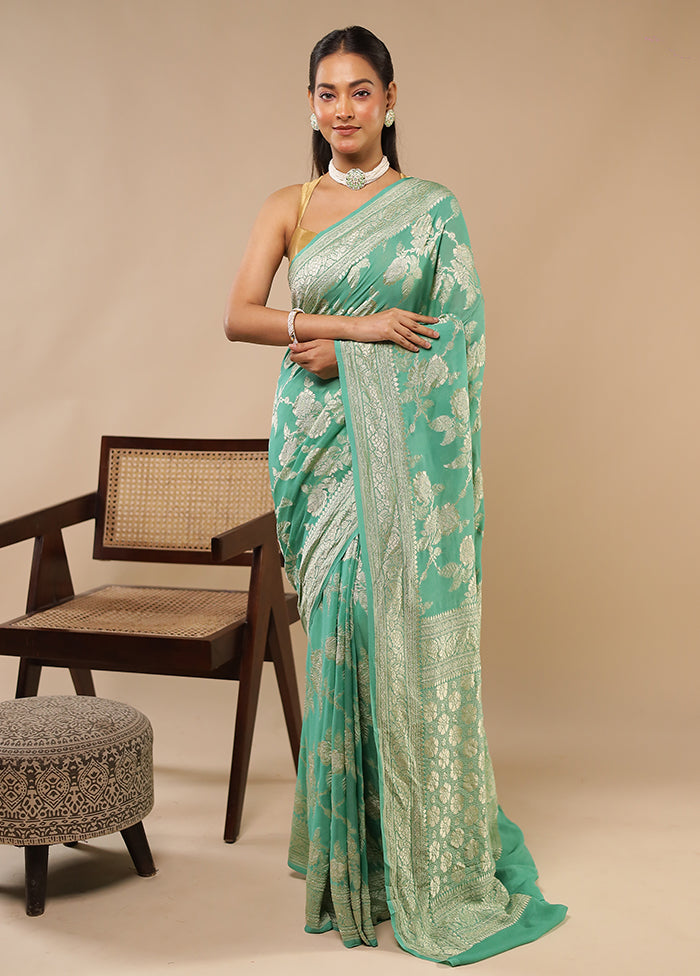 Green Handloom Pure Georgette Saree With Blouse Piece