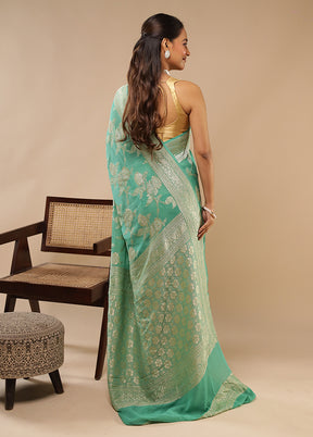 Green Handloom Pure Georgette Saree With Blouse Piece