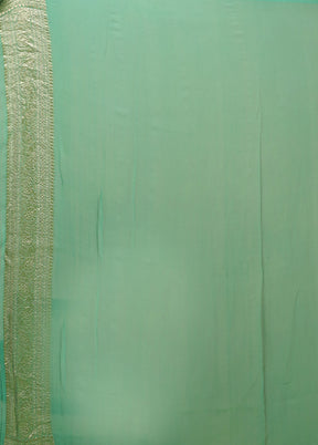 Green Handloom Pure Georgette Saree With Blouse Piece