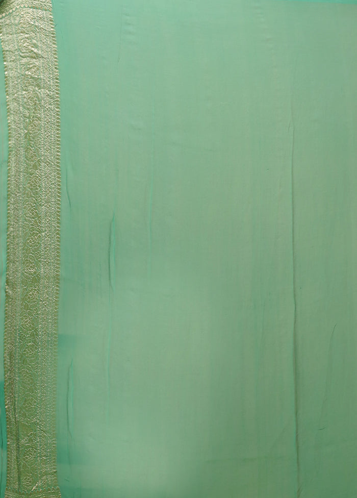 Green Handloom Pure Georgette Saree With Blouse Piece