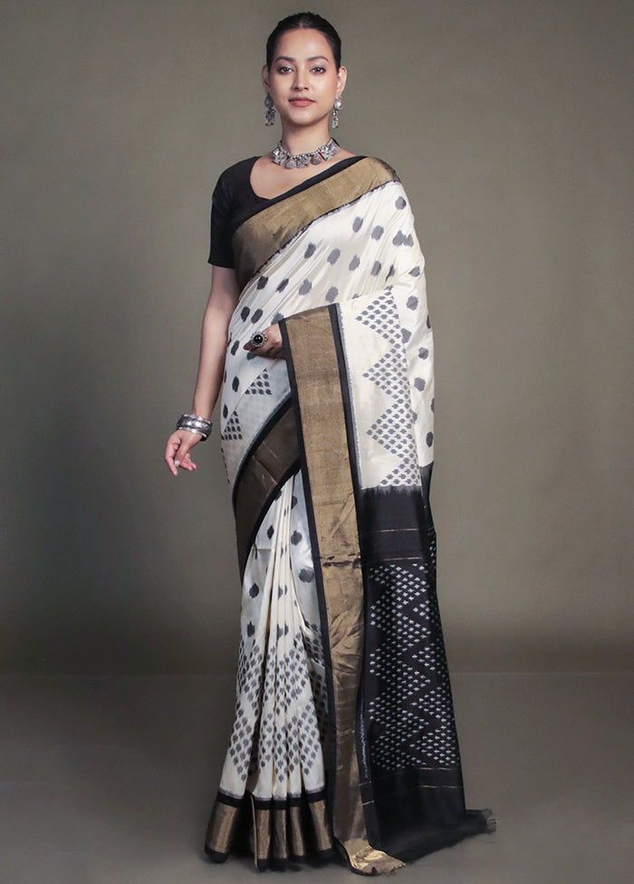 Cream Handloom Ikkat Pure Silk Saree With Blouse Piece
