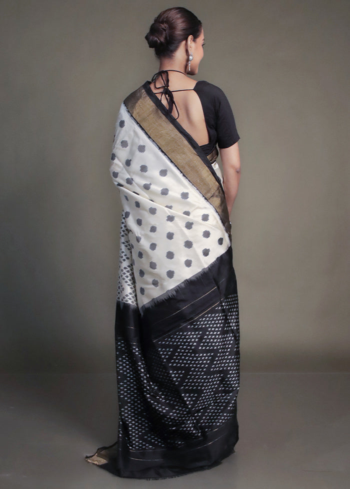 Cream Handloom Ikkat Pure Silk Saree With Blouse Piece