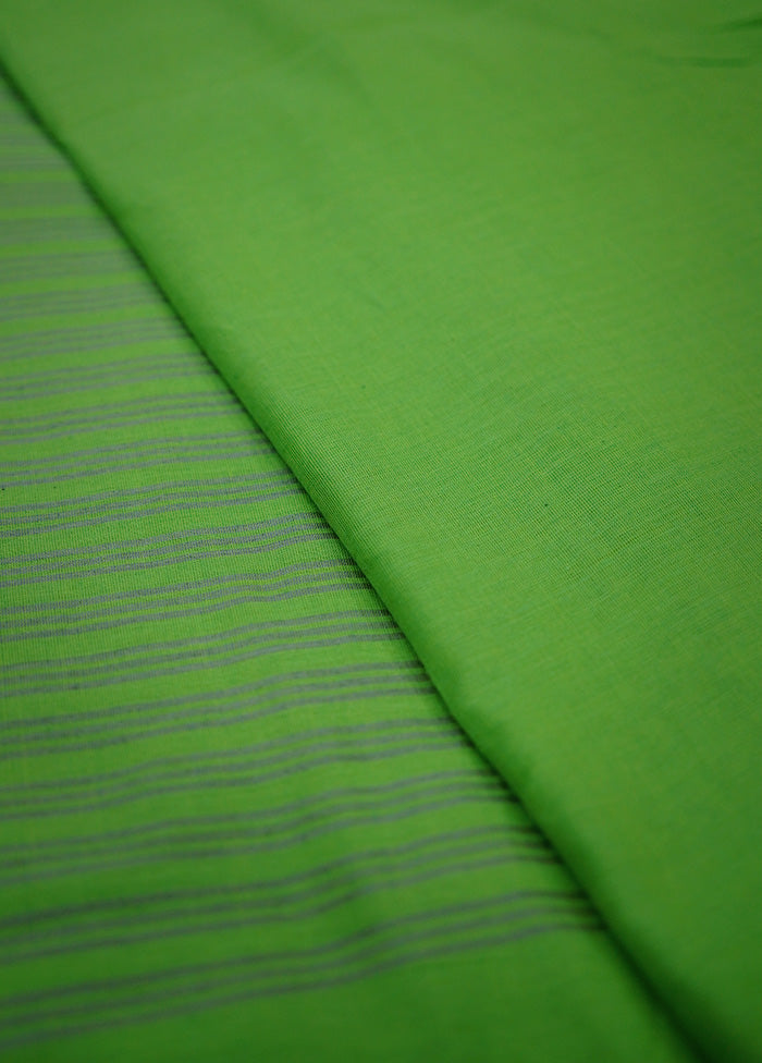 Green Cotton Saree With Blouse Piece