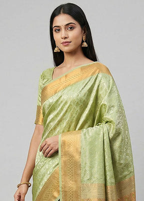 Green Kanjivaram Silk Saree With Blouse Piece