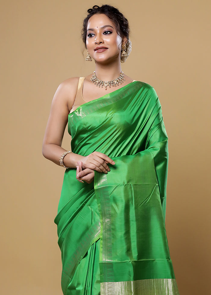 Green Kalakshetra Silk Saree With Blouse Piece
