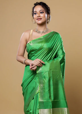 Green Kalakshetra Silk Saree With Blouse Piece