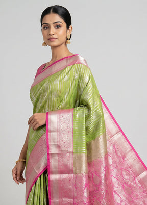 Green Kanjivaram Silk Saree With Blouse Piece