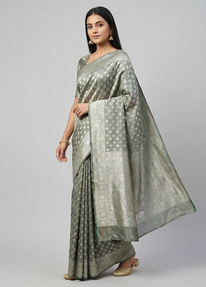 Green Tissue Silk Saree With Blouse Piece