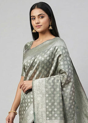 Green Tissue Silk Saree With Blouse Piece