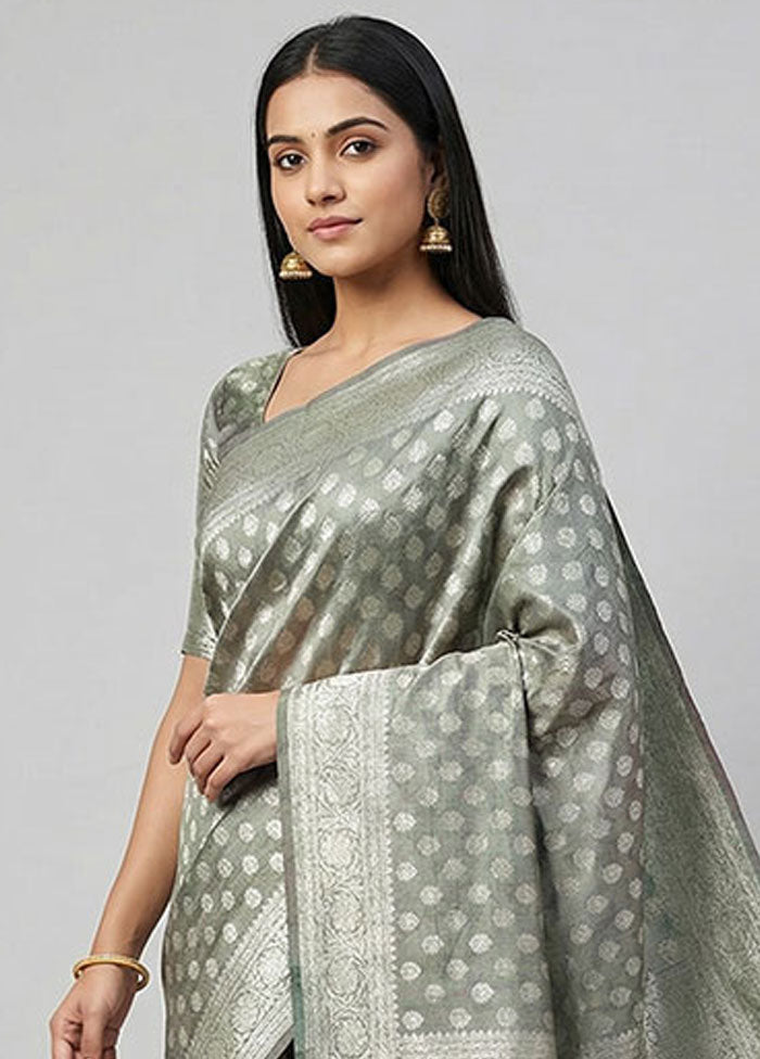 Green Tissue Silk Saree With Blouse Piece
