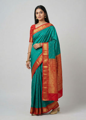 Green Kanjivaram Silk Saree With Blouse Piece