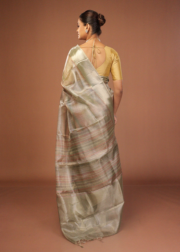 Green Tissue Silk Saree With Blouse Piece