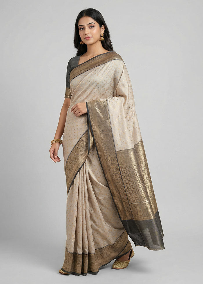 Cream Tissue Silk Saree With Blouse Piece