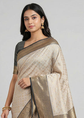 Cream Tissue Silk Saree With Blouse Piece