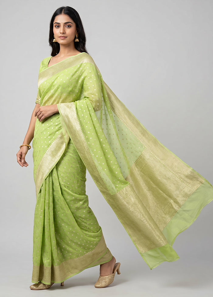 Green Handloom Pure Georgette Saree With Blouse Piece