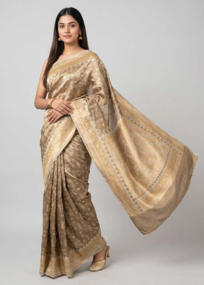 Cream Tissue Silk Saree With Blouse Piece