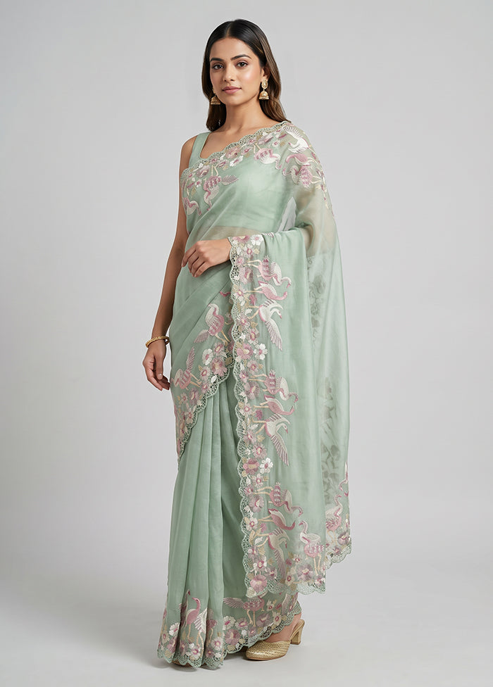 Green Tissue Silk Saree With Blouse Piece