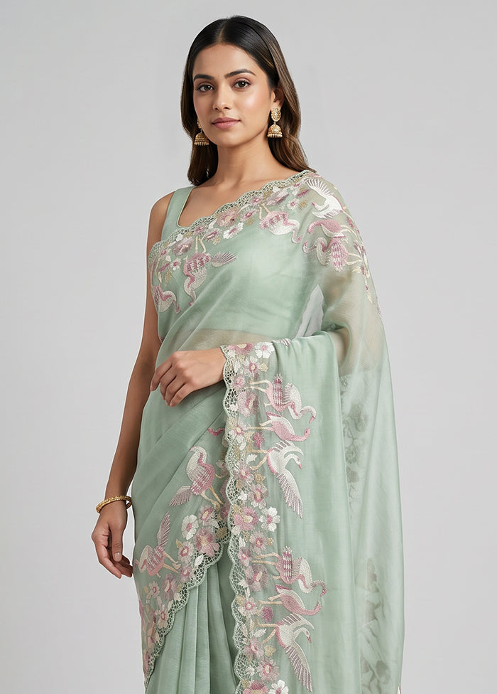 Green Tissue Silk Saree With Blouse Piece