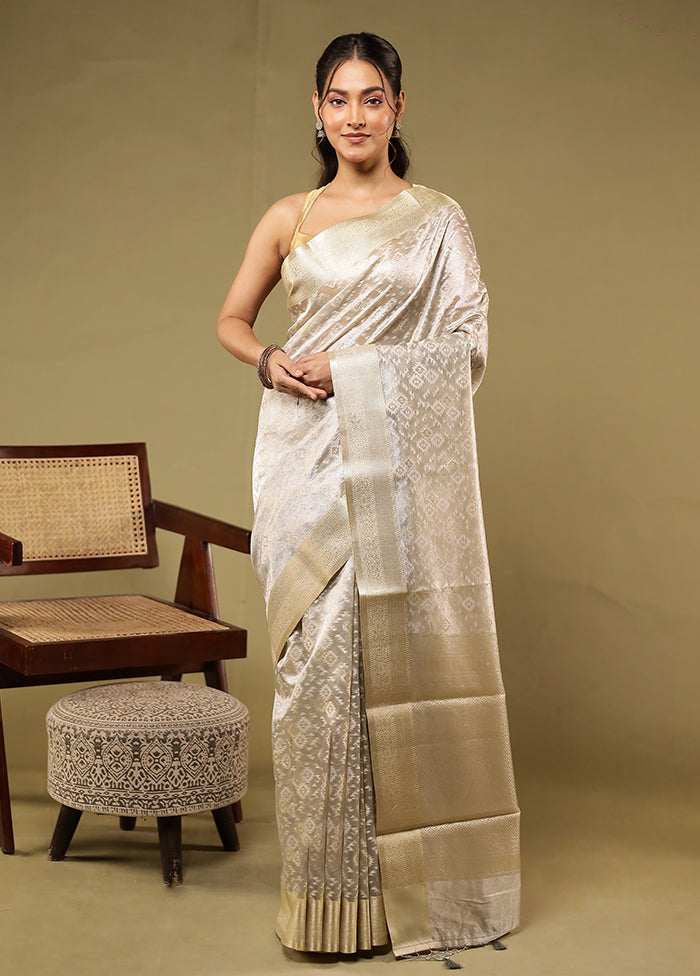 Cream Tissue Silk Saree With Blouse Piece