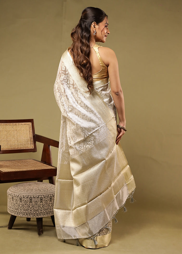 Cream Tissue Silk Saree With Blouse Piece