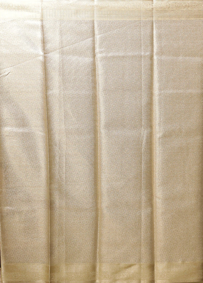 Cream Tissue Silk Saree With Blouse Piece
