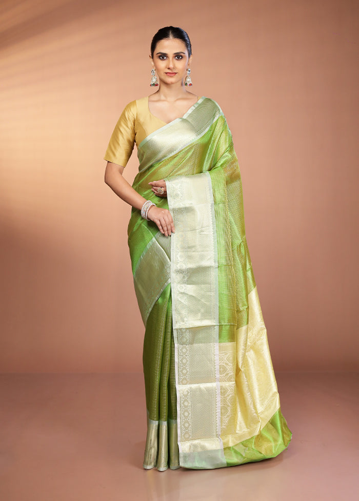 Green Tissue Silk Saree With Blouse Piece