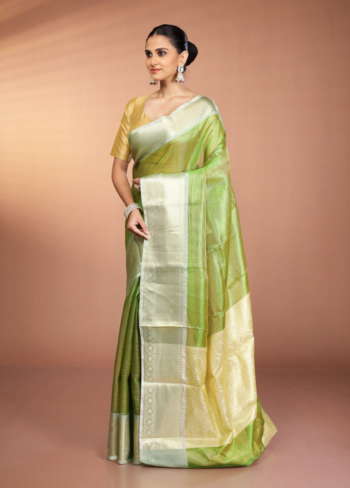 Green Tissue Silk Saree With Blouse Piece
