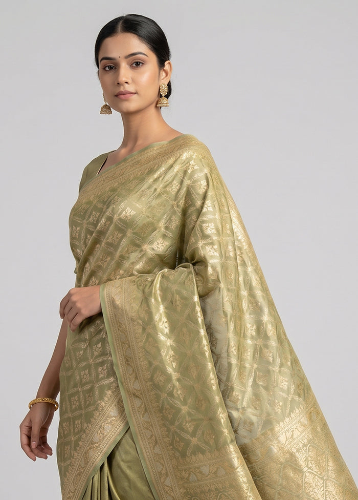 Green Tissue Silk Saree With Blouse Piece