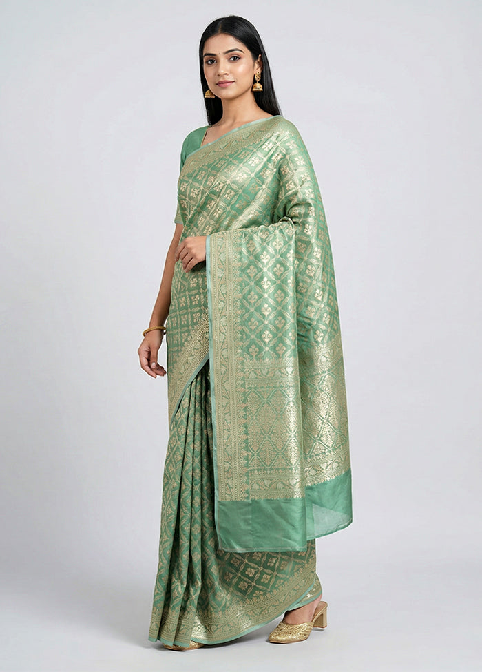 Green Tissue Silk Saree With Blouse Piece