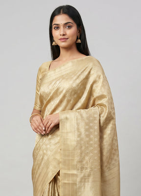 Cream Tissue Silk Saree With Blouse Piece