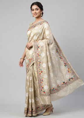 Cream Tissue Silk Saree With Blouse Piece