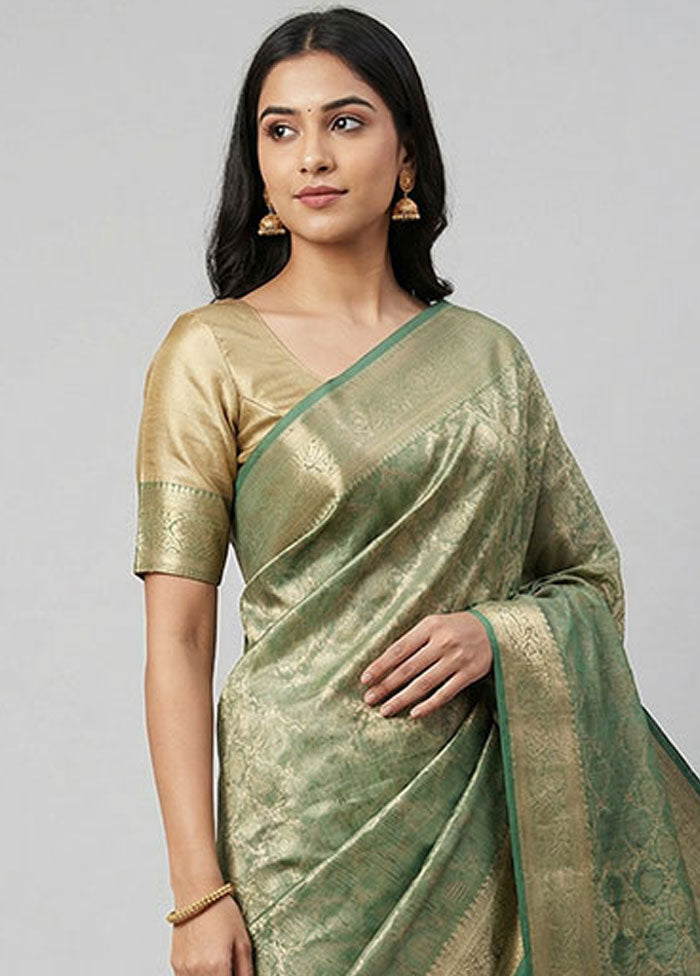 Green Tissue Silk Saree With Blouse Piece