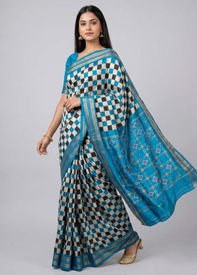 White Handloom Ikkat Pure Silk Saree With Blouse Piece