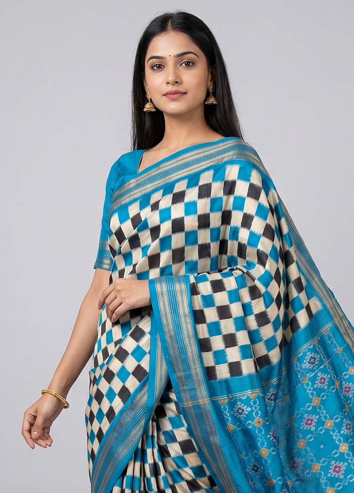 White Handloom Ikkat Pure Silk Saree With Blouse Piece