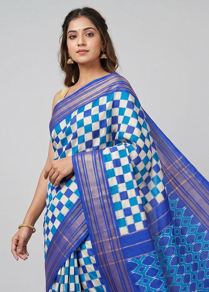 White Handloom Ikkat Pure Silk Saree With Blouse Piece