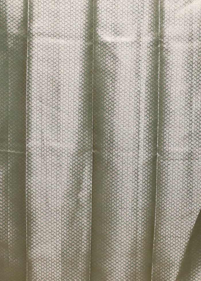 Green Tissue Silk Saree With Blouse Piece