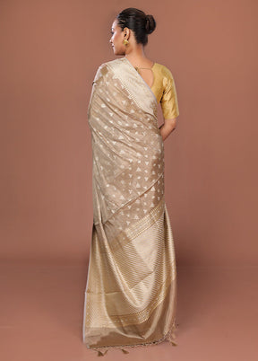Cream Tissue Silk Saree With Blouse Piece
