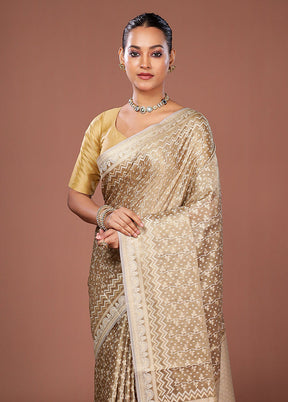 Cream Tissue Silk Saree With Blouse Piece