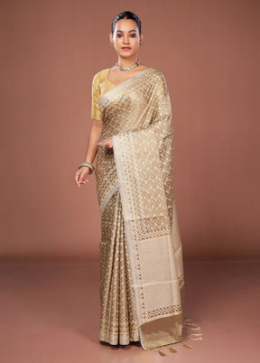 Cream Tissue Silk Saree With Blouse Piece