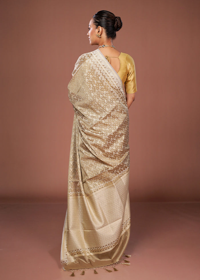 Cream Tissue Silk Saree With Blouse Piece