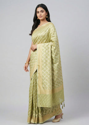 Green Tissue Silk Saree With Blouse Piece