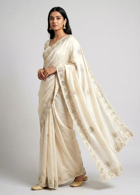 Cream Tissue Silk Saree With Blouse Piece