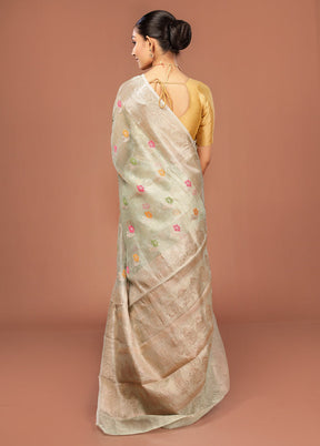 Green Tissue Silk Saree With Blouse Piece