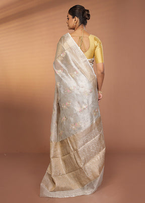 Green Tissue Silk Saree With Blouse Piece