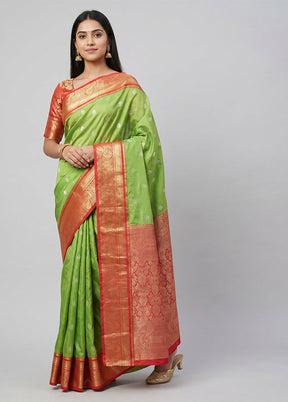 Green Kanjivaram Silk Saree With Blouse Piece