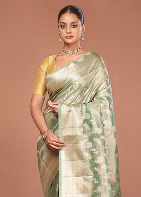 Green Tissue Silk Saree With Blouse Piece