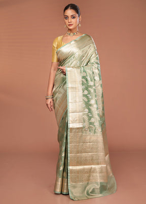 Green Tissue Silk Saree With Blouse Piece