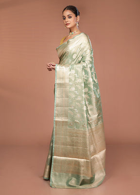 Green Tissue Silk Saree With Blouse Piece