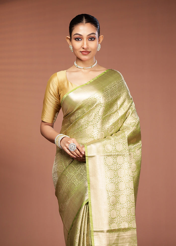 Green Tissue Silk Saree With Blouse Piece